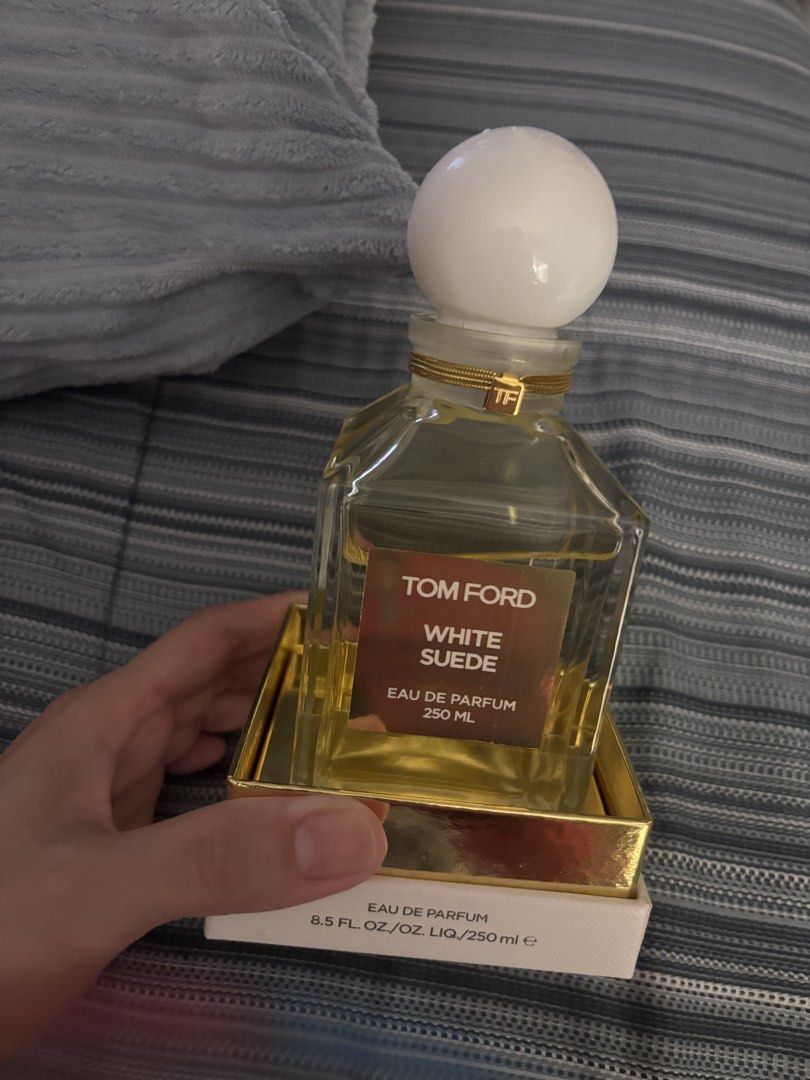 Tom Ford White Suede Eau De Parfum 250ml (Category: Fragrance & Deodorants) located in Paranaque City. Submitted by kikayjen (Listing ID 1469100310, Image 2). Description: - Authentic Tom Ford White Suede Eau de Parfum - Massive 250ml decant flacon with iconic gold label - Includes original white and gold outer box - Features signature round white cap with TF logo charm - 100% authentic, well-stored - This retails to 40k in dept stores and TF sta