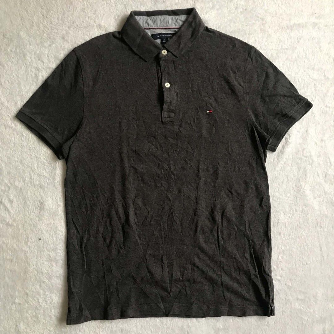TOMMY HILFIGER SLIM FIT (Category: Activewear) located in Cebu City. Submitted by kevinthrift (Listing ID 1468962416, Image 3). Description: TOMMY HILFIGER POLO (CHARCOAL) Excellent Condition Size: Medium on tag Dimes:Length 27 | Width 20 Color rate: 9.3/10 ( ISSUE ) fade neck maganda padin sabay sa color niya yung issue Need wash.