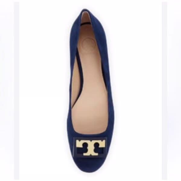Tory Burch Navy Suede Block Heel Pumps (Category: Heels) located in Batangas. Submitted by lovejiana27 (Listing ID 1469147949, Image 1). Description: - Brand: Tory Burch - Color: Navy blue - Material: Suede - Heel: Low block heel - Details: Gold hardware logo plaque on toe - Condition: Brand new, unworn with clean, scuff-free soles - Ideal for: Work, office wear, or dressing up.