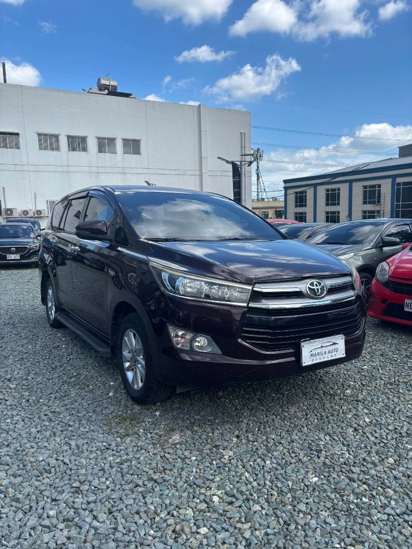 Toyota Innova G 2.0L Auto (Category: Used Cars) located in Pasig City. Submitted by pureocean-057512 (Listing ID 1468970219, Image 2). Description: 2018 TOYOTA INNOVA G 2.0L GAS AUTOMATIC TRANSMISSION Downpayment: ₱175,360 Blackish Red Mica 65tkms mileage 2.0L Gasoline Engine 8 ending plate Automatic Transmission Touch screen infotainment system Brushed aluminum trimmings Spacious 2nd row with stow away table Super Cold AC Anti-lock Braking Syste