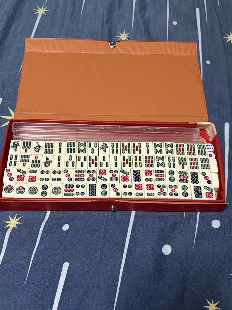 Travel Mahjong Set with Red Case (Category: Board Games & Puzzles) located in Manila. Submitted by fries21 (Listing ID 1469076811, Image 1). Description: Compact and portable size, ideal for travel, camping, and game nights Fyi, there's cracks on the acrylic stand. Aside from that everything is ok.