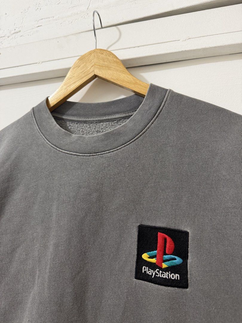 Travis Scott Cactus Jack x PlayStation Sweatshirt Grey (Category: Coats, Jackets and Outerwear) located in Manila. Submitted by newarrivalph (Listing ID 1469072764, Image 2). Description: - Item: Travis Scott x PlayStation Cactus Jack Crewneck - Color: Vintage Washed Charcoal Grey - Size: Large - Details: Embroidered PS logo on chest, Cactus Jack branding on sleeve - Comfort: Thick fleece lining inside, ribbed cuffs and collar - Perfect for: Hype