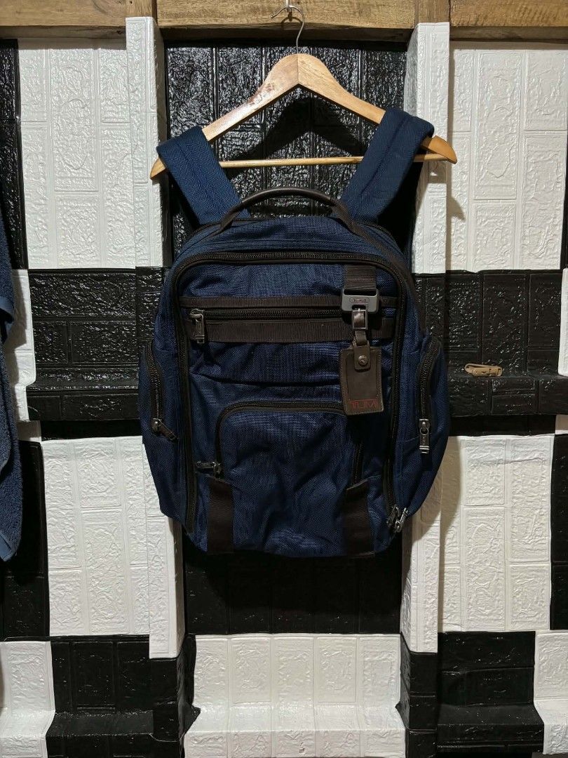 Tumi Blue Backpack With Brown Leather Details (Category: Backpacks) located in Lapu Lapu. Submitted by margaux099 (Listing ID 1468963105, Image 1). Description: - Authentic Tumi backpack in blue with stylish brown leather accents - Branded metal zippers and durable fabric construction built to last - Multiple front zippered compartments for easy organization - Padded mesh back panel and shoulder straps for maximum comfort - Built-in leather lugga