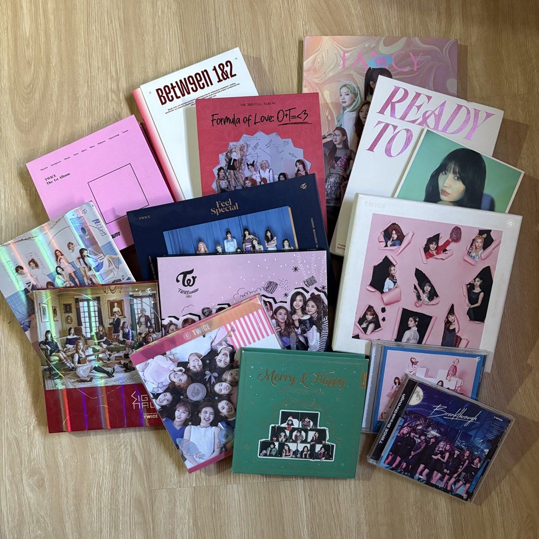 TWICE Albums Take All (Category: CDs & DVDs) located in Makati City. Submitted by yoiscart (Listing ID 1469012173, Image 1). Description: TWICE ALBUMS - Some still have the photocards. See pics. - One or two albums have flaws (falling apart pages but overall in good condition) - I’m a ONCE since Page Two era. I took care of this collection. - Negotiable! .