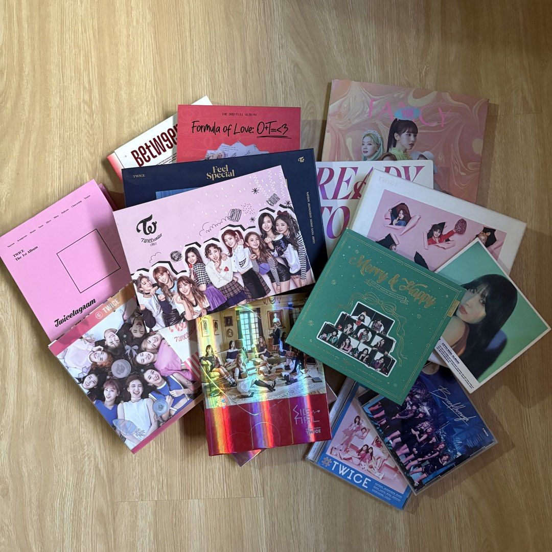 TWICE Albums Take All (Category: CDs & DVDs) located in Makati City. Submitted by yoiscart (Listing ID 1469012173, Image 2). Description: TWICE ALBUMS - Some still have the photocards. See pics. - One or two albums have flaws (falling apart pages but overall in good condition) - I’m a ONCE since Page Two era. I took care of this collection. - Negotiable! .