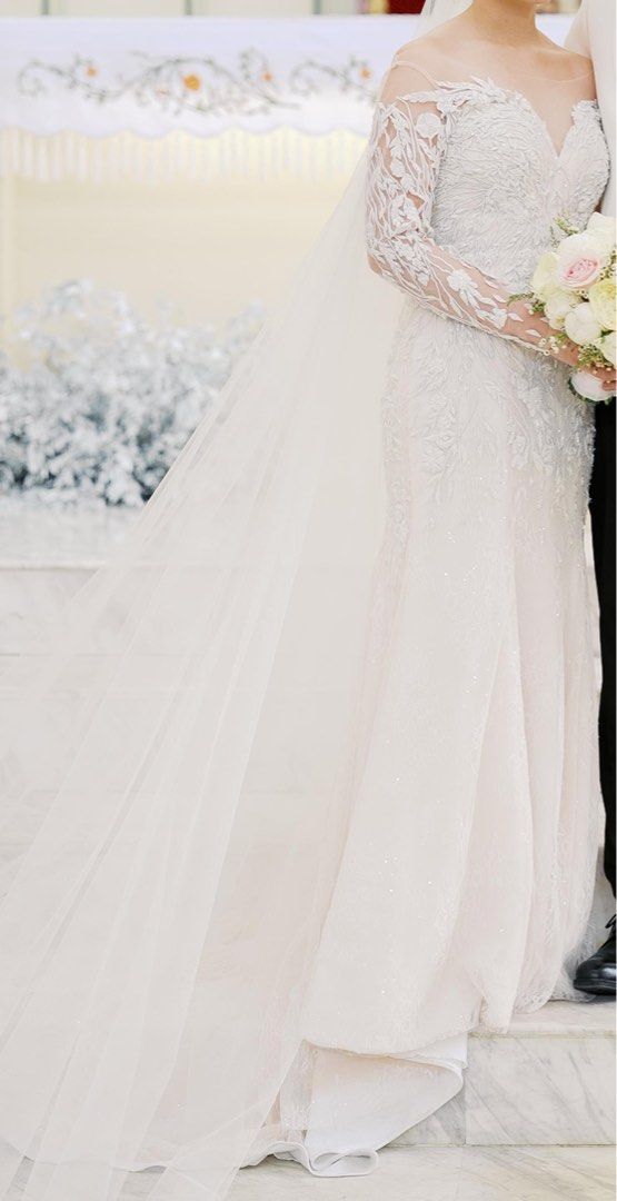 Two-Way Wedding Gown (Category: Evening dresses & gowns) located in Cebu City. Submitted by mikranza (Listing ID 1468946201, Image 2). Description: FOR SALE: Two-Way Wedding Gown | ₱38,000 negotiable Embellished wedding gown, worn once and professionally dry cleaned. Shown in two looks: with lace sleeves for the ceremony and strapless for the reception. Matching sleeves and veil included. The sleeves can be sewn back on if preferred. Fits small t