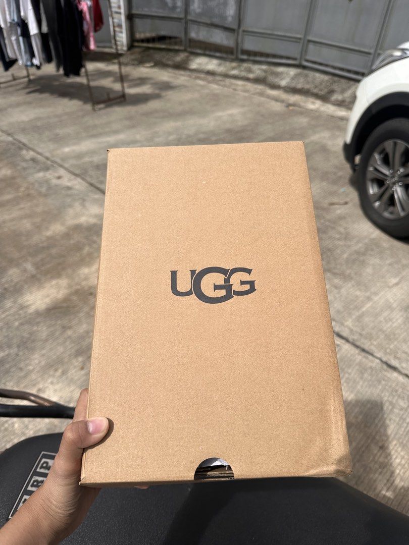 UGG W Scuffette II Slippers Sand Size 8 (Category: Slippers and slides) located in Dinalupihan. Submitted by helloimmikeee (Listing ID 1468992601, Image 2). Description: - Brand: UGG W Scuffette II - Color: Sand - Size: US 8 / EU 39 (25cm) - Material: Suede upper with cozy sheepskin collar - Condition: Brand new, unworn, fresh out of packaging - Inclusions: Original box and tissue paper included .