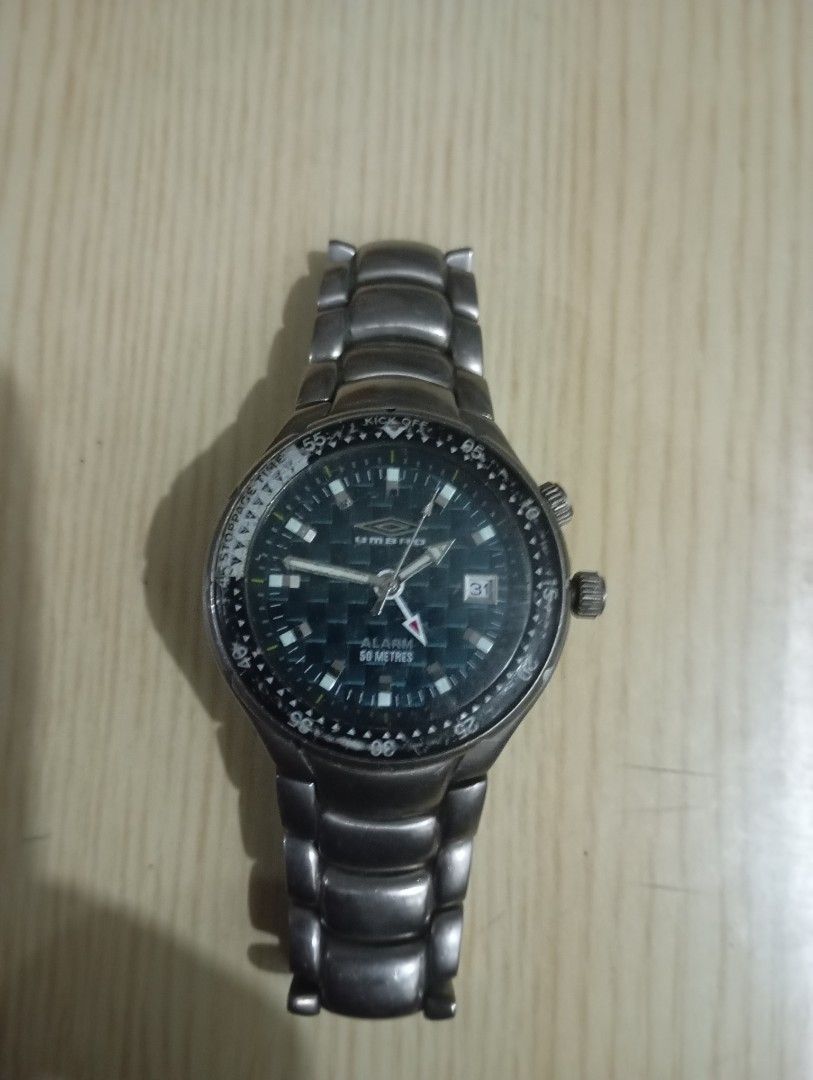 Umbro titanium (Category: Men's Watches) located in Las Pinas. Submitted by quick_deals_great_finds2 (Listing ID 1469068938, Image 2). Description: Original good working condition Quartz with battery 38mm fits wrist 7 inches.