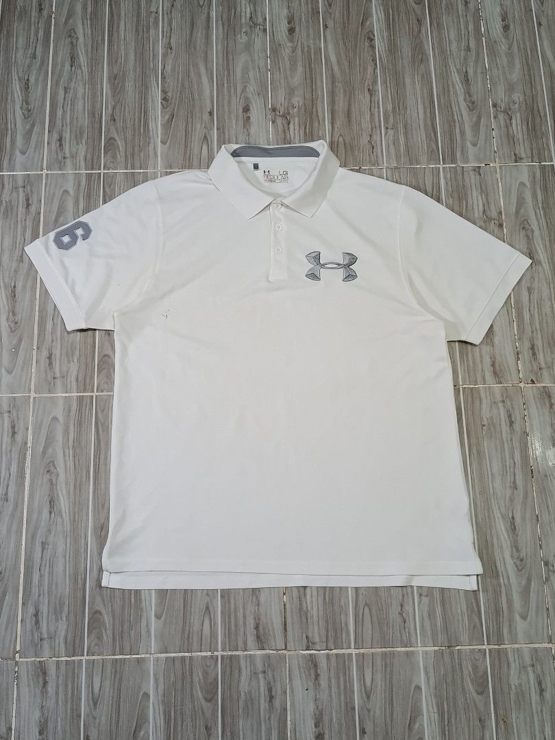 UNDER ARMOUR DRIFIT POLO SHIRT (freeshipping) (Category: Activewear) located in Quezon City. Submitted by gyl-stop (Listing ID 1469083319, Image 1). Description: free shipping 22.5x28.5 very good condi cr: 9.5/10 issue: none.