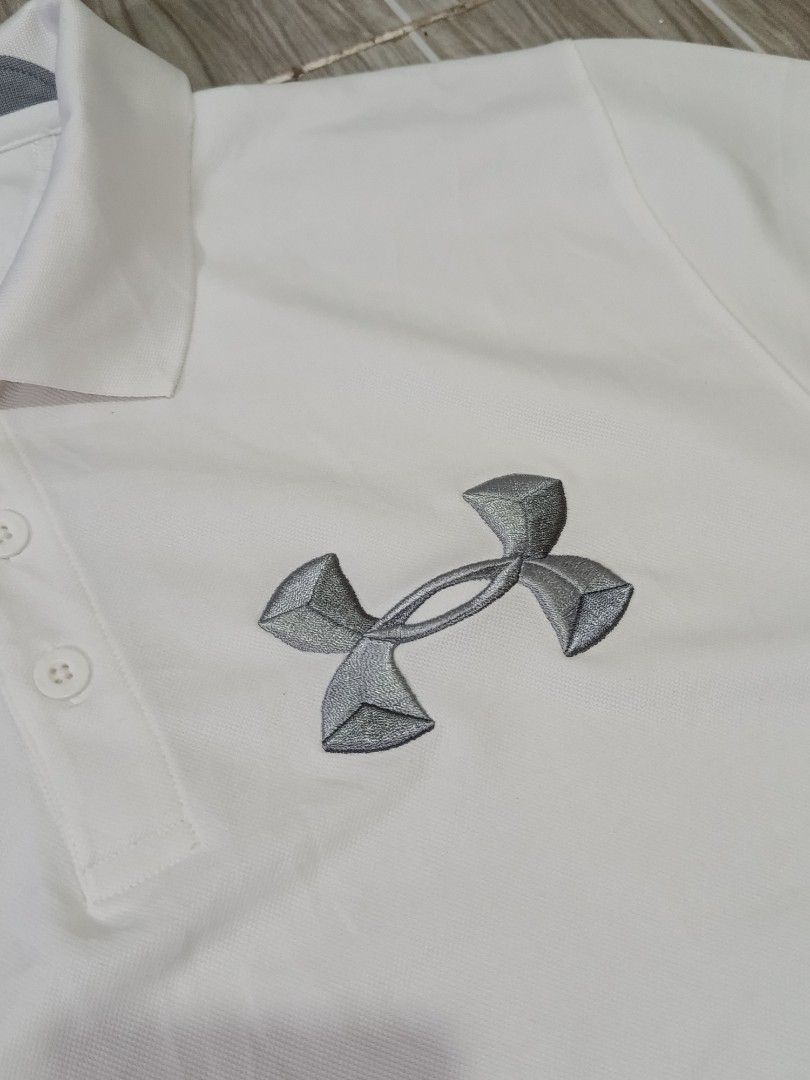 UNDER ARMOUR DRIFIT POLO SHIRT (freeshipping) (Category: Activewear) located in Quezon City. Submitted by gyl-stop (Listing ID 1469083319, Image 3). Description: free shipping 22.5x28.5 very good condi cr: 9.5/10 issue: none.