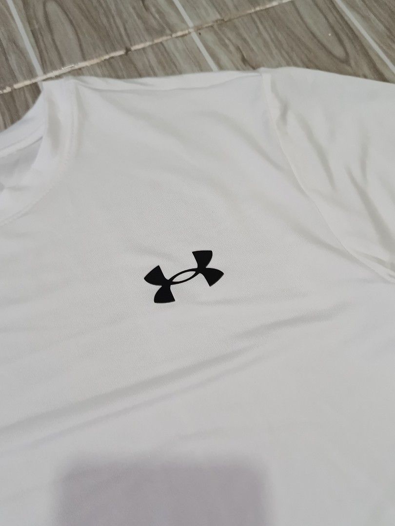 UNDER ARMOUR DRIFIT TSHIRT (freeshipping) (Category: Activewear) located in Quezon City. Submitted by gyl-stop (Listing ID 1469084126, Image 2). Description: free shipping 18.5 x 24 excellent condi cr: 9.8/10 issue: none.