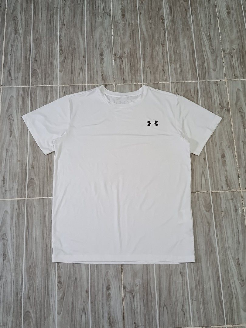 UNDER ARMOUR DRIFIT TSHIRT (freeshipping) (Category: Activewear) located in Quezon City. Submitted by gyl-stop (Listing ID 1469084126, Image 1). Description: free shipping 18.5 x 24 excellent condi cr: 9.8/10 issue: none.