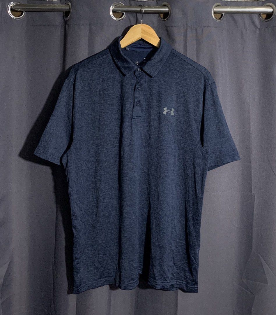 Under Armour Polo Shirt (Category: Tshirts & Polo Shirts ) located in Cebu City. Submitted by drip.co (Listing ID 1469070508, Image 1). Description: Under Armour Polo Shirt Size: Large Dimes: 22x29 Color Rate: 9.8/10 Excellent Condition Issue: Loose Stitch 450 + sf.