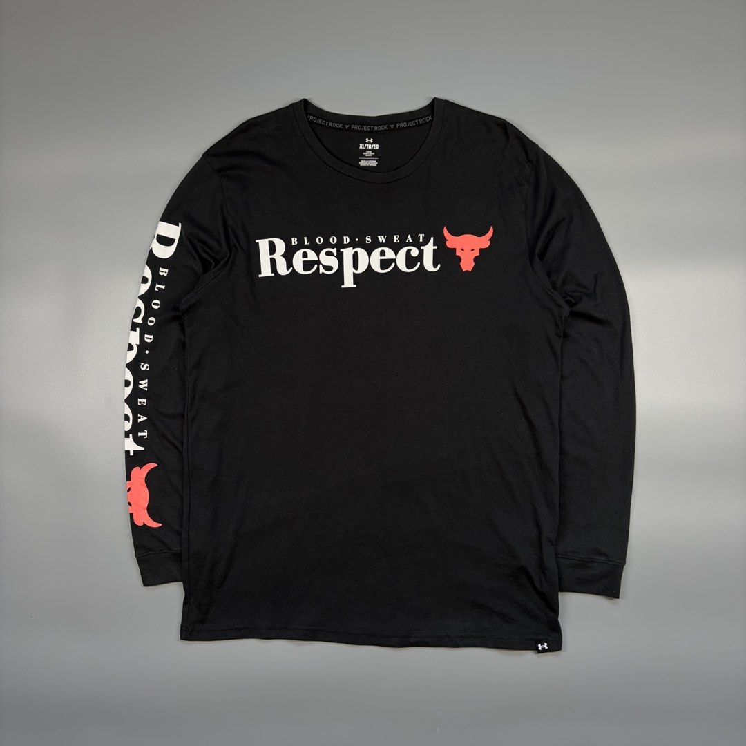 Under Armour Project Rock long sleeve (Category: Activewear) located in Cavite. Submitted by onebeancent (Listing ID 1469014595, Image 2). Description: Size: Large Dimension: 21" Width | 27" Length Color: Black Color Rate: 10/10 Issue: None Condition: Like new‼️ Price: 750php Additional Shipping Fee (J&T Small Pouch) 75php Luzon 100php visayas 120php mindanao.