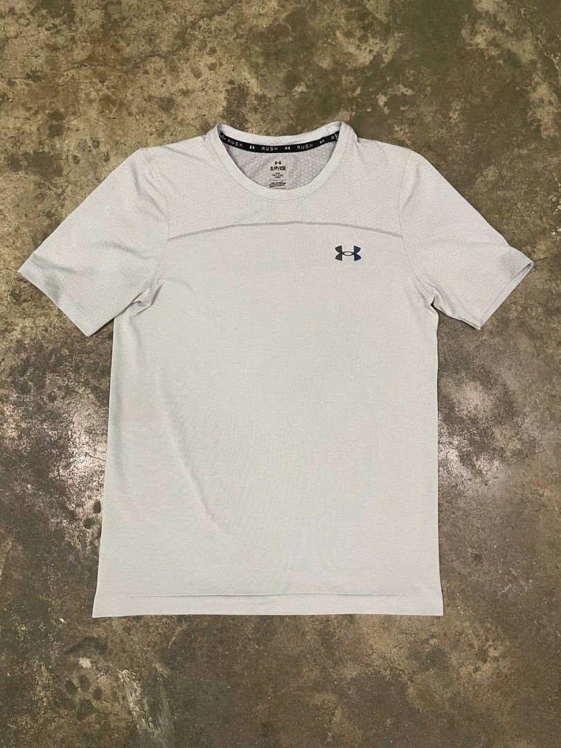 Under armour rush (Category: Formal Shirts) located in Rodriguez. Submitted by randomthrift777 (Listing ID 1469107433, Image 1). Description: 25.5 by 18 under armour rush.