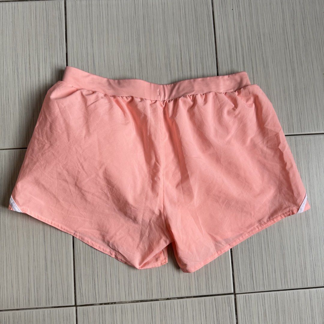 Underarmour running shorts (Category: Activewear) located in Makati City. Submitted by ellespreloved2.0 (Listing ID 1469051059, Image 2). Description: In very good condition No flaw Fits 27-30 With built in undies Inside pocket and draw strings.