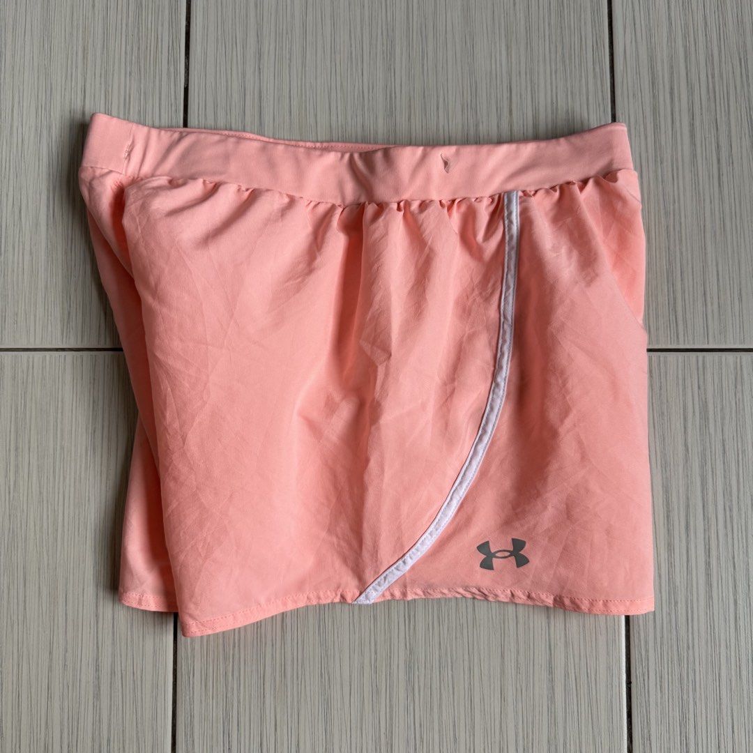 Underarmour running shorts (Category: Activewear) located in Makati City. Submitted by ellespreloved2.0 (Listing ID 1469051059, Image 3). Description: In very good condition No flaw Fits 27-30 With built in undies Inside pocket and draw strings.