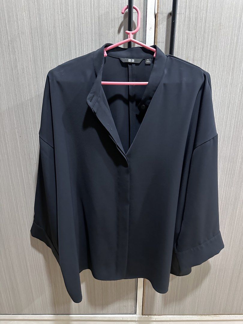Uniqlo blouse (Category: Blouses) located in Bulacan. Submitted by ressemar (Listing ID 1468974178, Image 1). Description: Uniqlo Blouse Used once RFS. Masyado malaki for me Size XL in tag .