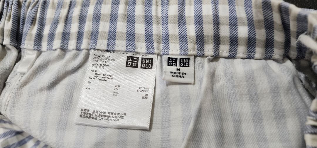 [Uniqlo] Blue Gingham Drawstring Cotton Pants (Category: Other Bottoms) located in Manila. Submitted by bibimboop (Listing ID 1469064955, Image 3). Description: Uniqlo blue gingham checkered garterized pants, in medium size. From Hong Kong, I think. The pants are 97% cotton and 3% spandex; the material is soft, smooth, breathable, and quite thin. There are no pockets. Please note that the drawstring's fabric has thinned out a bit. Waist: 24-27" H