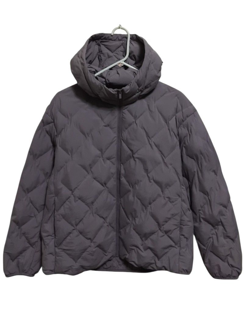 Uniqlo Purple Lavender Pufftech Parka (Category: Coats, Jackets and Outerwear) located in Pasig City. Submitted by hustlexcurate (Listing ID 1468999547, Image 1). Description: Uniqlo Purple Lavender Pufftech Parka Size XL Dimensions: 23X26.