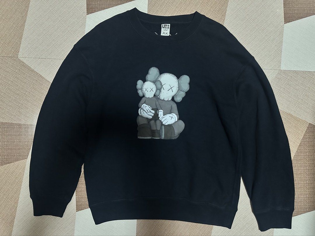 Uniqlo UT x Kaws Crewneck (Category: Coats, Jackets and Outerwear) located in Baguio. Submitted by littlearchive (Listing ID 1469009692, Image 1). Description: width: 21" length: 25" small on tag.