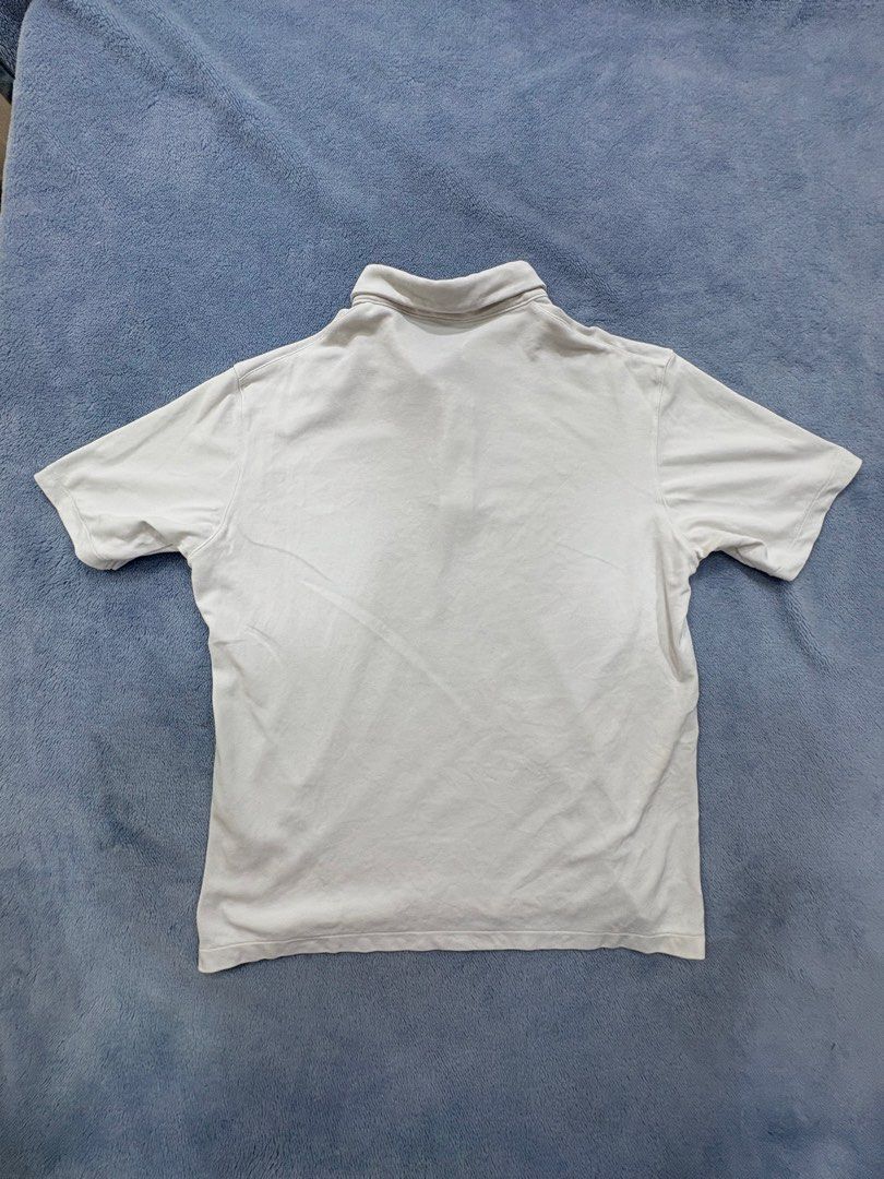 UNIQLO White Polo (Category: Tshirts & Polo Shirts ) located in Alburquerque. Submitted by ukay_ni_edgar (Listing ID 1469020699, Image 1). Description: Clean, minimal, and timeless. A wardrobe essential for effortless style. ✨.