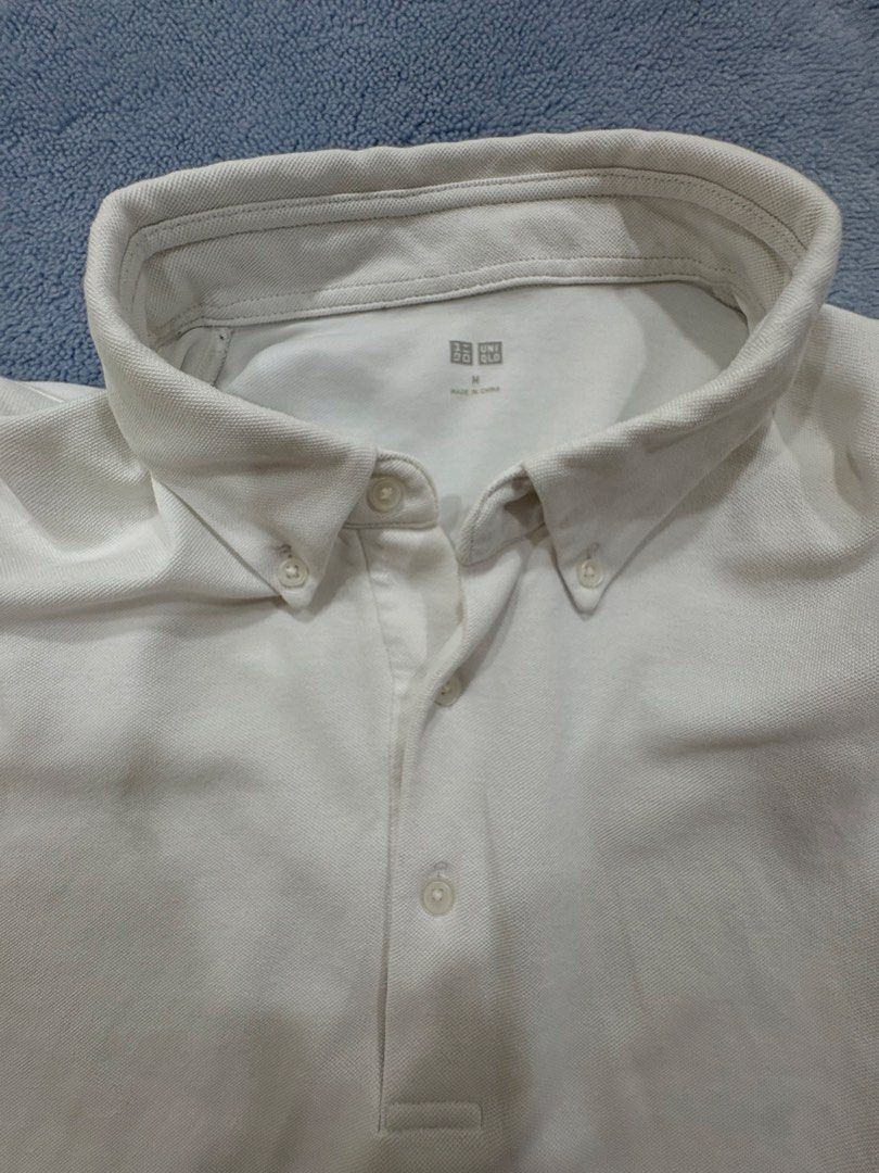 UNIQLO White Polo (Category: Tshirts & Polo Shirts ) located in Alburquerque. Submitted by ukay_ni_edgar (Listing ID 1469020699, Image 3). Description: Clean, minimal, and timeless. A wardrobe essential for effortless style. ✨.