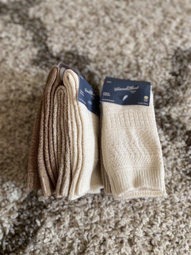 Universal Thread Crew Socks Cotton Blend Neutral Colors (Category: Socks) located in Batangas. Submitted by lux_kimmy (Listing ID 1468988917, Image 2). Description: - Brand: Universal Thread - Material: Soft cotton blend - Colors: Neutral palette (cream, beige, and brown) - Design: Classic ribbed texture through the leg - Size: Fits shoe sizes 4-10 (fits most) - Condition: Brand new with paper tags attached (unboxed pack).