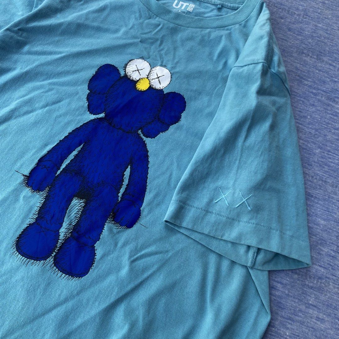 UT X KAWS (Category: Formal Shirts) located in Angeles City. Submitted by stephen52790 (Listing ID 1469059014, Image 2). Description: 🟥UT X KAWS (INCH) Size: L Width: 19.5 Length: 28 •Good as new •Fresh print •Issue: Minimal tiny stain only Price: 450PHP.