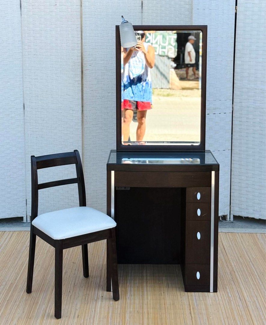 Vanity Dresser / Vanity Mirror (Category: Tables & Sets) located in Manila. Submitted by elliefurnies31 (Listing ID 1469125480, Image 1). Description: JAPAN SURPLUS VANITY DRESSER WITH CHAIR IN GOOD CONDITION SIZE: 29H x 24.5L x 16W inches 30 mirror height 17.5H x 15L x 14.5W inches.