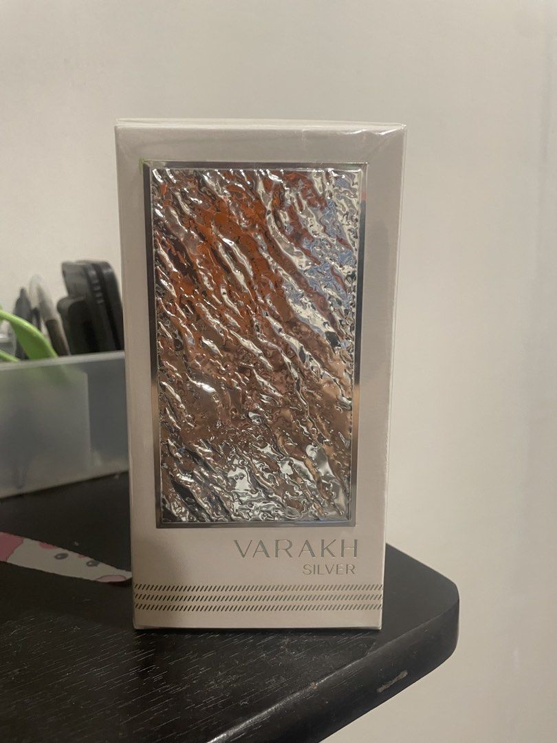 Varakh Silver Fragrance World (Category: Fragrance & Deodorants) located in Quezon City. Submitted by brave_dowayne (Listing ID 1469127570, Image 3). Description: - Brand: Fragrance World - Product: Varakh Silver Perfume - Condition: 100% brand new, unopened, and factory sealed - Fragrance Profile: Complex and captivating - Main Accords: Aromatic, fresh spicy, woody, musky, powdery, amber, and soft spicy - Ideal for: Fragrance lovers who enjoy ri