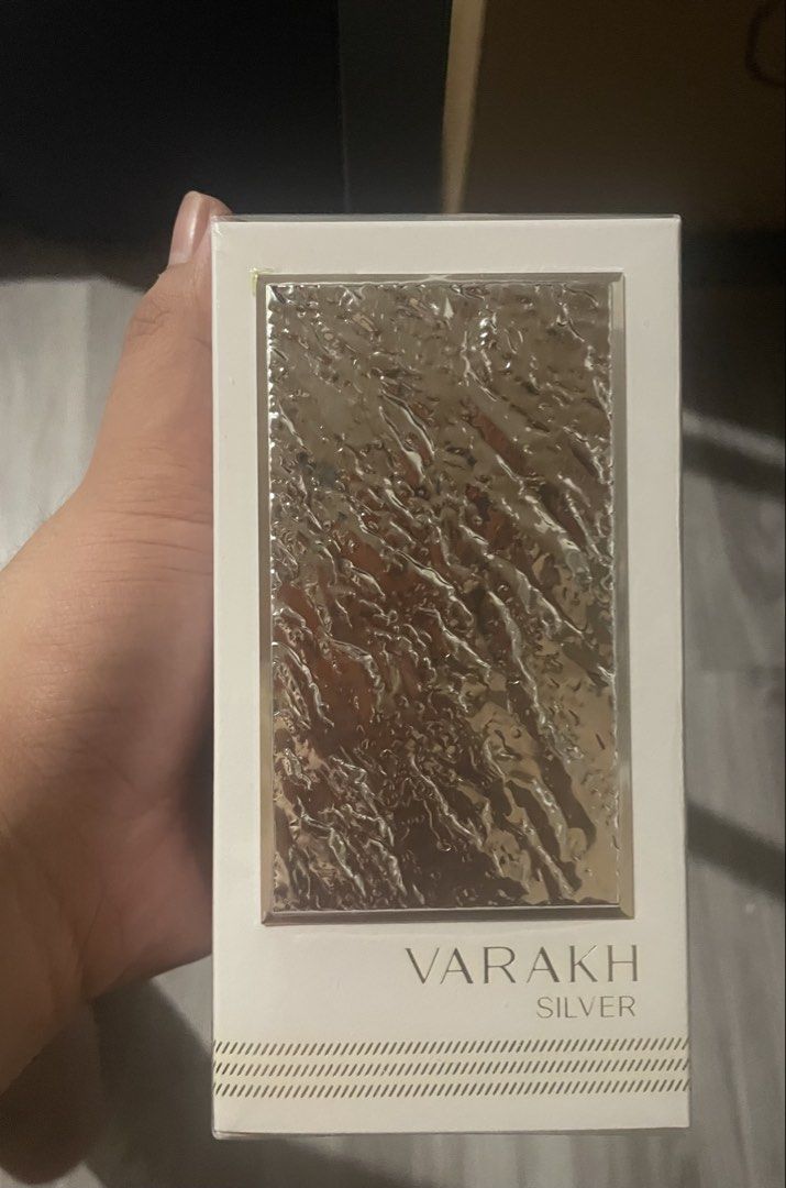 Varakh Silver Fragrance World (Category: Fragrance & Deodorants) located in Quezon City. Submitted by brave_dowayne (Listing ID 1469127570, Image 2). Description: - Brand: Fragrance World - Product: Varakh Silver Perfume - Condition: 100% brand new, unopened, and factory sealed - Fragrance Profile: Complex and captivating - Main Accords: Aromatic, fresh spicy, woody, musky, powdery, amber, and soft spicy - Ideal for: Fragrance lovers who enjoy ri