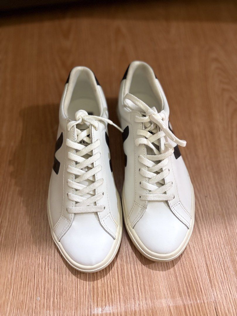 Veja Esplar White Black Leather Sneakers (Category: Casual Shoes) located in Manila. Submitted by prelovedby_yna (Listing ID 1469099214, Image 1). Description: - Veja Esplar Low-Top - White leather with black logo and heel tab - Standard fit - Condition: Clean uppers with minor sole wear from normal use - No box - Check photo listing for size - Nego.