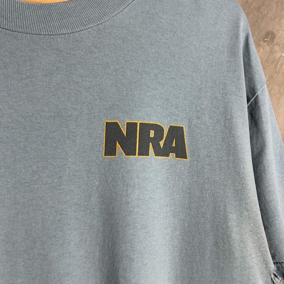 Vintage 2000’s NRA - Mullet Tee (Category: Tshirts & Polo Shirts ) located in Tayabas. Submitted by streetdept.ph (Listing ID 1469111099, Image 3). Description: Vintage 2000’s NRA - Mullet Tee Measurements (inches): Width: 21.5” Length: 29” Tagged as Large 8/10 condition Flaw/s: both armpit has issues & minimal hairlines .
