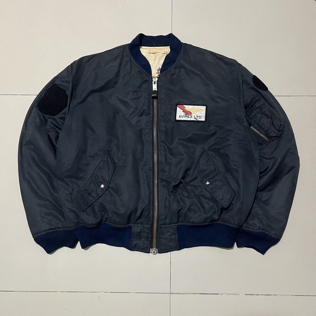 VINTAGE AVIREX BRYAN PARK BANK RIVERSIBLE BOMBER JACKET (Category: Coats, Jackets and Outerwear) located in Manila. Submitted by balanse (Listing ID 1468942806, Image 1). Description: DIMES: 27W X 27L EXCELLENT CONDITION. 9.9 HONEST COLOR RATE. ISSUE: 2MISSING PATCH .