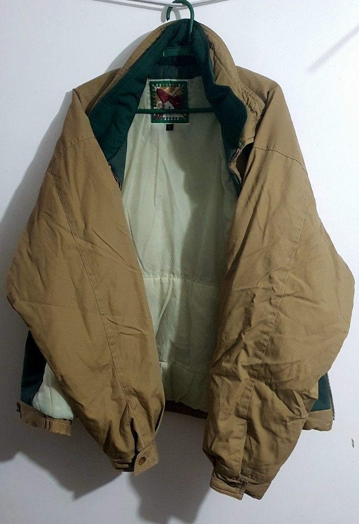 Vintage Brown Bomber Jacket with Green Collar (Category: Coats, Jackets and Outerwear) located in Castillejos. Submitted by hornets0000 (Listing ID 1468974320, Image 2). Description: Unisex Vintage Boxy Tan Windbreaker Jacket 1990s Gorpcore PHP 300 📝 Product Description Vintage 90s Khaki/Tan Unisex Utility Windbreaker Jacket Awesome retro 1990s outdoor/sailing jacket in a perfect boxy, oversized fit. Features a clean tan/khaki body with a contra