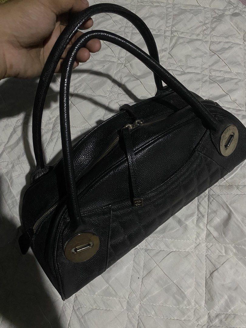 VINTAGE CHANEL SQUARE QUILT BUTTON HANDLE BAG (Category: Luxury Bags & Wallets) located in Naga. Submitted by hubthrift2 (Listing ID 1469051084, Image 3). Description: Details of this chanel bags • Semi-circular dome / mini bowler shape with square-quilted lower panel details and signature button accents on the sides. •: Durable pebbled caviar (lychee) leather. • : Silver-tone accents with dual top handles. • Era: Released around the mid-2000s (2