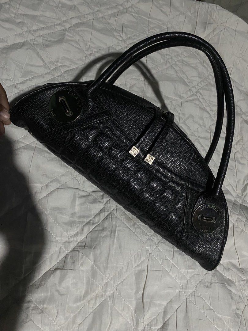 VINTAGE CHANEL SQUARE QUILT BUTTON HANDLE BAG (Category: Luxury Bags & Wallets) located in Naga. Submitted by hubthrift2 (Listing ID 1469051084, Image 2). Description: Details of this chanel bags • Semi-circular dome / mini bowler shape with square-quilted lower panel details and signature button accents on the sides. •: Durable pebbled caviar (lychee) leather. • : Silver-tone accents with dual top handles. • Era: Released around the mid-2000s (2