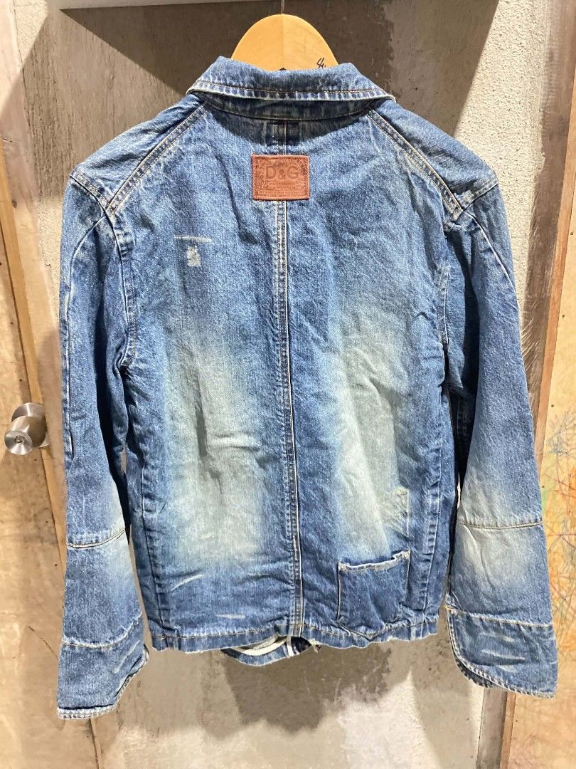Vintage D&G Dolce & Gabbana Denim Jacket (Category: Coats, Jackets and Outerwear) located in Bontoc. Submitted by tedanzthrift (Listing ID 1468931977, Image 2). Description: -vantage D&G Dolce & Gabbana distressed mud washed denim blazer - Origin: Made in Italy - Style: Vintage denim jacket with classic wash and intentional distressing - Fit: Regular fit - Details: Front button closure, multiple functional pockets - Unique Feature: Iconic leather