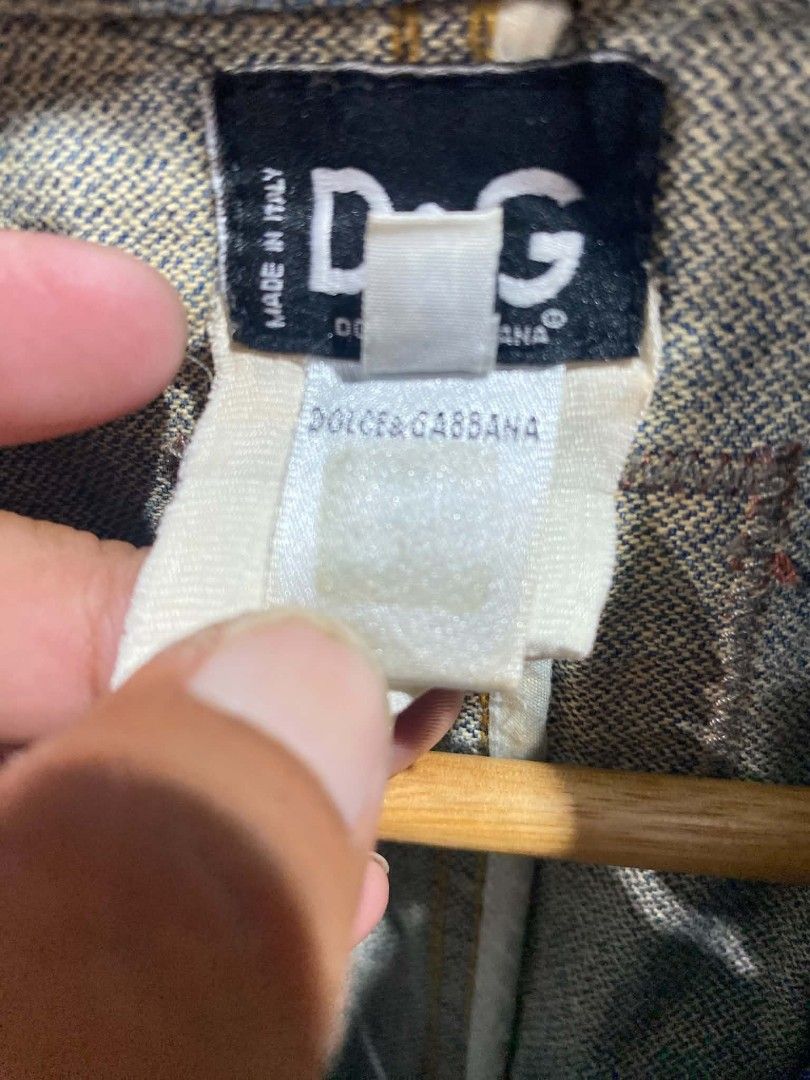 Vintage D&G Dolce & Gabbana Denim Jacket (Category: Coats, Jackets and Outerwear) located in Bontoc. Submitted by tedanzthrift (Listing ID 1468931977, Image 3). Description: -vantage D&G Dolce & Gabbana distressed mud washed denim blazer - Origin: Made in Italy - Style: Vintage denim jacket with classic wash and intentional distressing - Fit: Regular fit - Details: Front button closure, multiple functional pockets - Unique Feature: Iconic leather