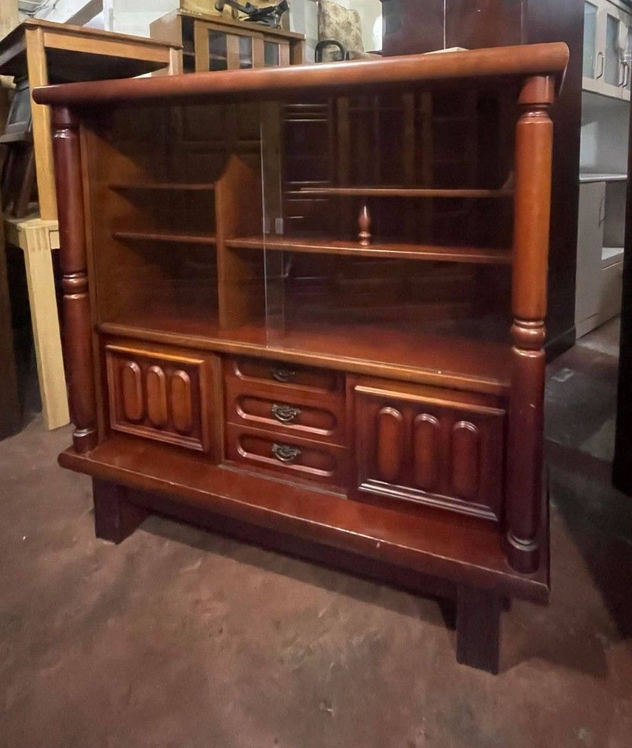 Vintage Display Sideboard Cabinet Credenza (Category: Shelves, Cabinets & Racks) located in Quezon City. Submitted by dannikkishoppe2 (Listing ID 1469160929, Image 3). Description: Vintage Display Sideboard Cabinet Credenza ‼️₱8000‼️ ✨ Elegant design with a beautiful wooden finish ✨ Glass display doors with shelves ✨ With 2 side cabinets and 3 center drawers ✨ Sturdy wooden construction ✨ Perfect for displaying collections, glassware, and home de