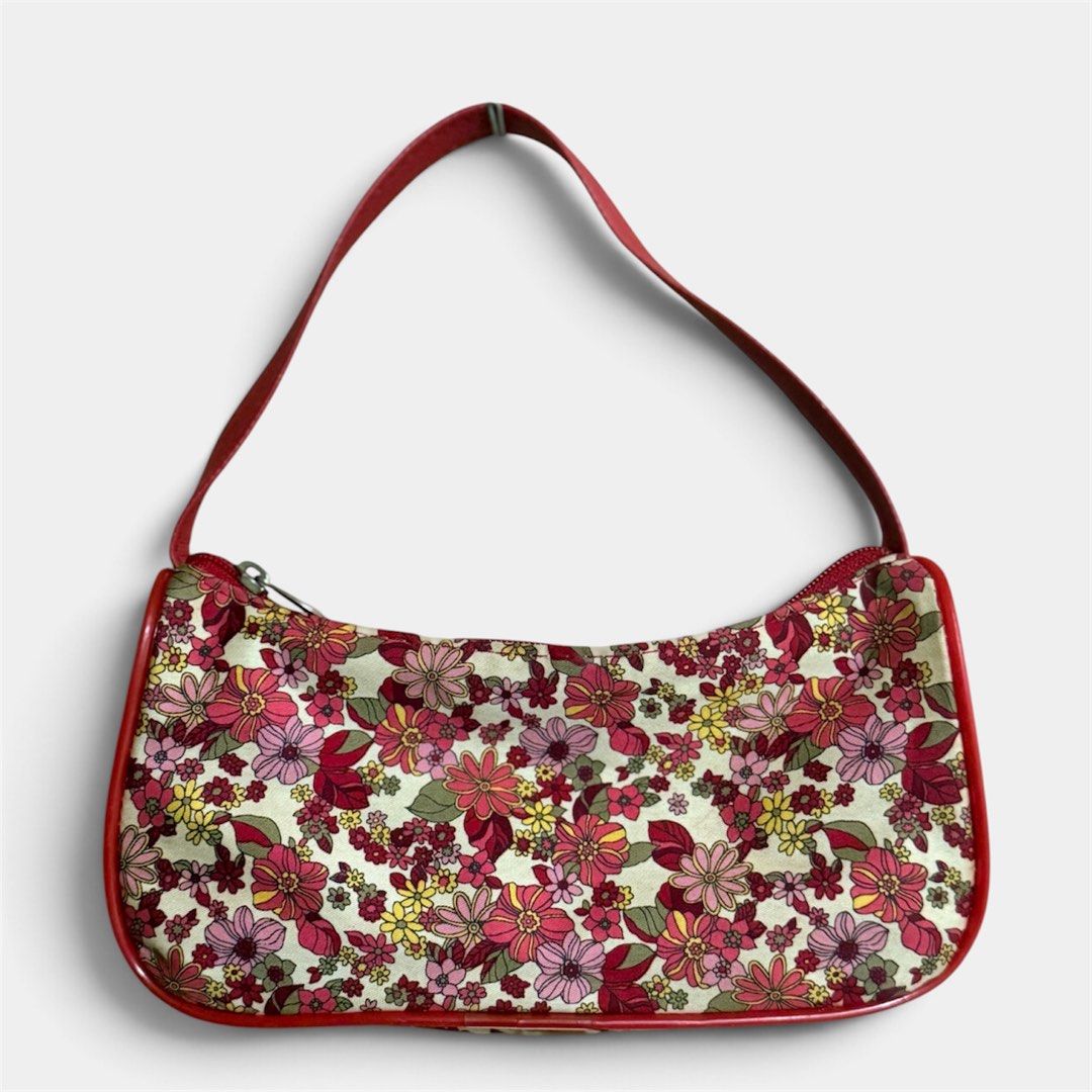 Vintage floral print shoulder bag (Category: Shoulder Bags) located in Manila. Submitted by only_alyssacloset (Listing ID 1469011601, Image 1). Description: Style: Retro-inspired underarm baguette shoulder bag Design: Colorful all-over floral print on a cream background with red leather trimming .