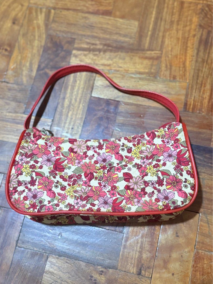 Vintage floral print shoulder bag (Category: Shoulder Bags) located in Manila. Submitted by only_alyssacloset (Listing ID 1469011601, Image 2). Description: Style: Retro-inspired underarm baguette shoulder bag Design: Colorful all-over floral print on a cream background with red leather trimming .