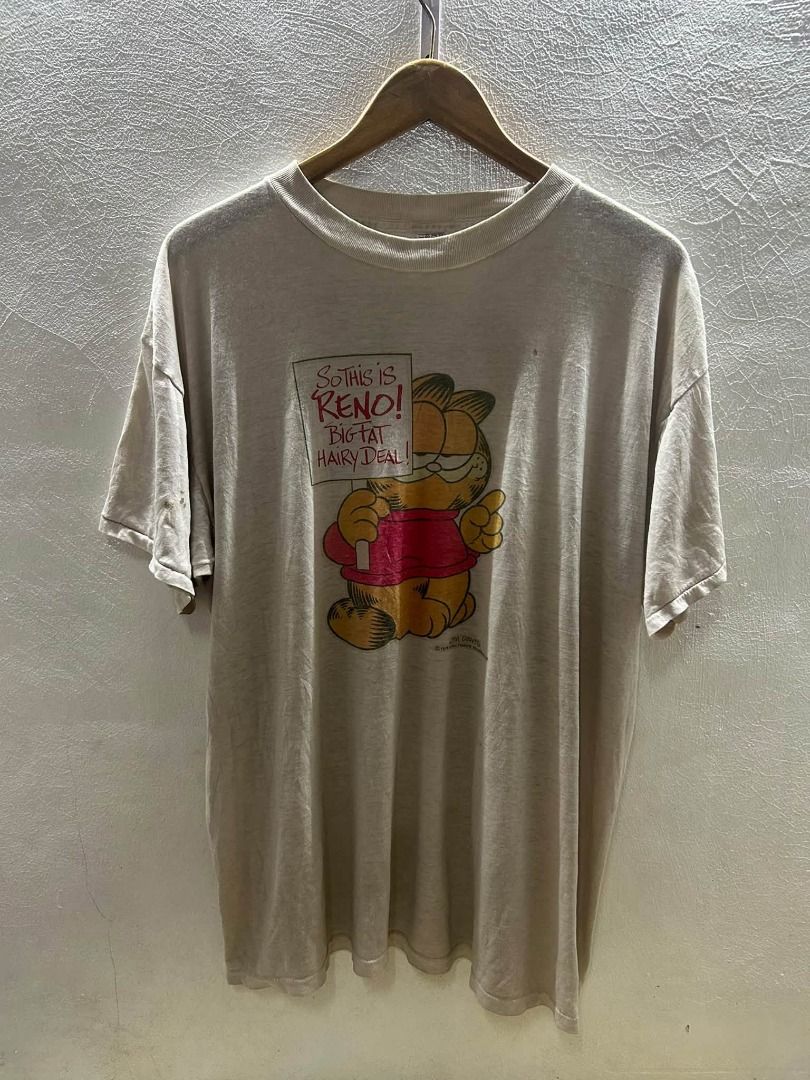 VINTAGE GARFIELD GRAPHIC TEE DATED 1978 SINGLE STITCH (Category: Tshirts & Polo Shirts ) located in Caloocan City. Submitted by j3ngsanity (Listing ID 1469088832, Image 1). Description: TAG : INFO TAG DIMES : 24x30.5 ISSUE : STAINS .