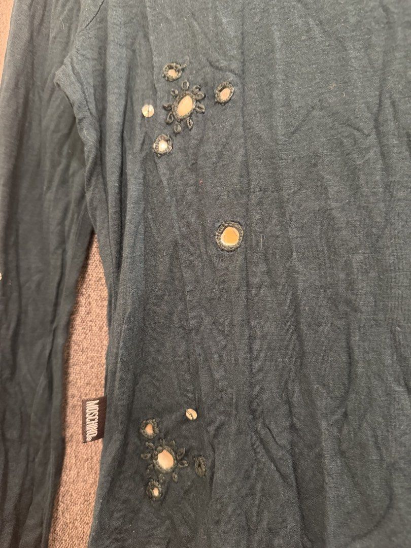 Vintage Moschino (Category: Longsleeves) located in Quezon City. Submitted by macleen17 (Listing ID 1469019236, Image 3). Description: Vintage Moschino Size xs Mirror design Issue multiple Pinhole check on photos Grenn Color .