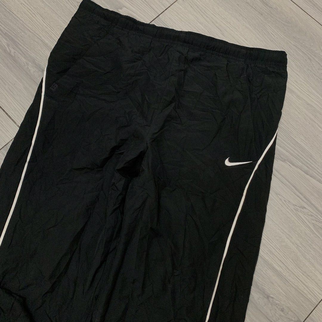 Vintage Nike Trackpants One Line (Category: Activewear) located in Manila. Submitted by arxxxm (Listing ID 1469069299, Image 2). Description: Vintage Nike Trackpants One Line 28-36" waist 40" length 9.5" close leg opening 10" open zip leg excellent condition has zipper sides 700 + sf 📥.