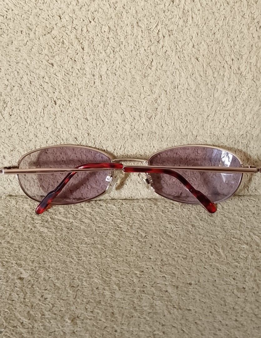 Vintage Oval Sunglasses (Category: Sunglasses & Eyewear) located in Tarlac. Submitted by faithfulfinds (Listing ID 1468997716, Image 2). Description: Vintage Oval Sunglasses 🕶️ Condition: Like new / No issue (Gagamitin na lang!) Source: Japan surplus / Japan source Brand: Unbranded (Premium quality feel) Tinted lenses with classic gold metal frame. Walang gasgas o kahit anong sira..