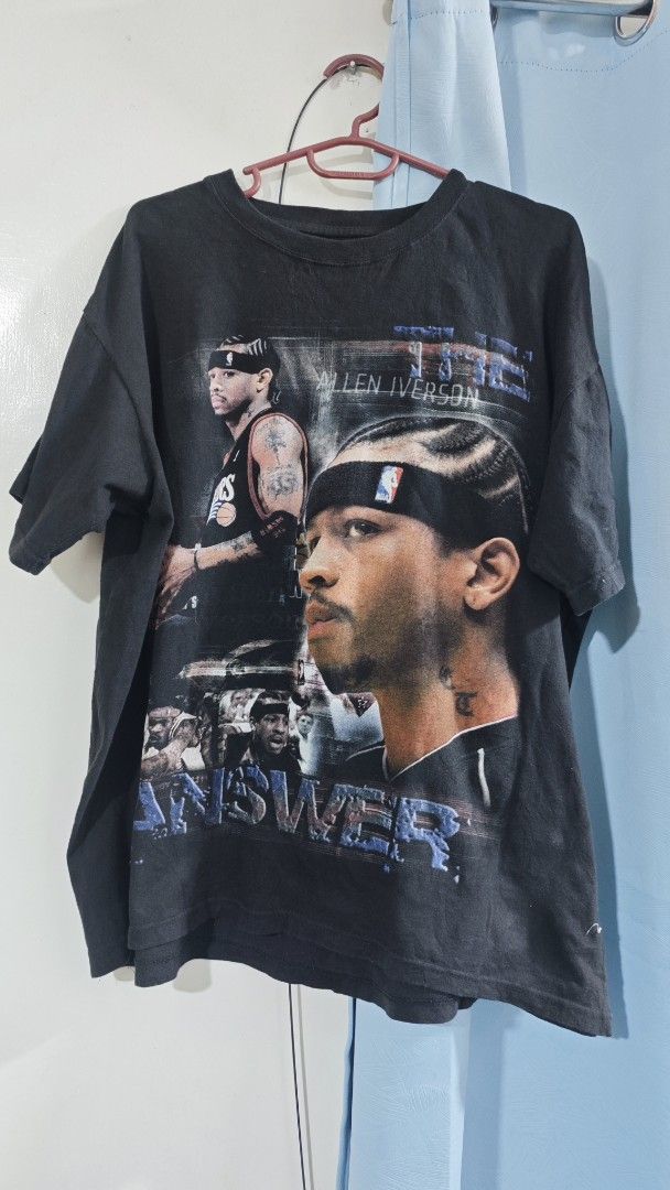 Vintage shirt allen iverson (Category: Tshirts & Polo Shirts ) located in Davao. Submitted by jhinkertzp55934 (Listing ID 1468946306, Image 1). Description: - Design: Bold front graphic of Allen Iverson with "The Answer" text - Size: XXL with a relaxed fit - Material: 100% heavy cotton - Style: Vintage bootleg raptee style - Condition: Excellent pre-loved condition.