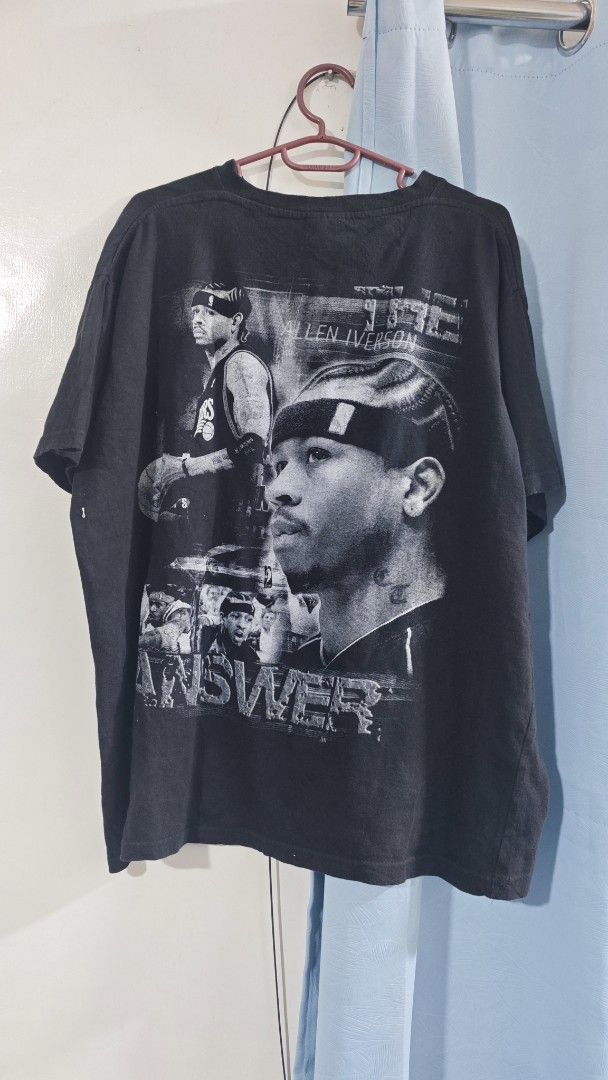 Vintage shirt allen iverson (Category: Tshirts & Polo Shirts ) located in Davao. Submitted by jhinkertzp55934 (Listing ID 1468946306, Image 2). Description: - Design: Bold front graphic of Allen Iverson with "The Answer" text - Size: XXL with a relaxed fit - Material: 100% heavy cotton - Style: Vintage bootleg raptee style - Condition: Excellent pre-loved condition.