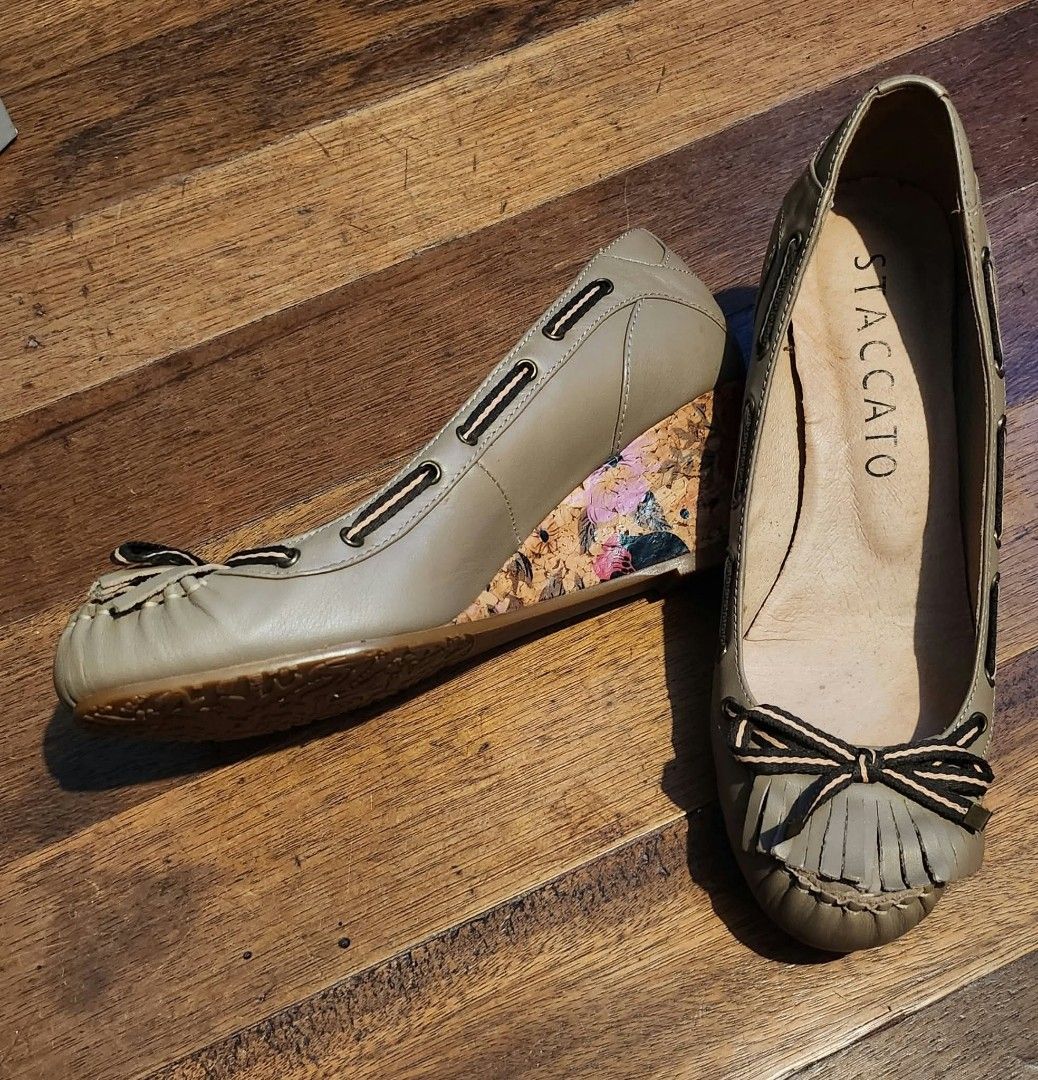 Vintage Staccato Wedge Shoes (Category: Wedges) located in Cebu City. Submitted by vincelouie30387 (Listing ID 1469010983, Image 2). Description: - Brand: Staccato - Type: Vintage Slip-on moccasin wedges - Size: EU 38 - Color: Beige upper with colorful floral print heel - Material: Leather - Features: Fringe and bow detail on the toe, printed wedge heel - Pinterest vibes.